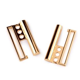 Arany színű fém kabátcsat / kapocs: 50 mm széles