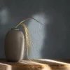 Naomi: Elegáns bézs-grafitcsillám szöttes hatású (mosható) vlies alapon hab felületű tapéta