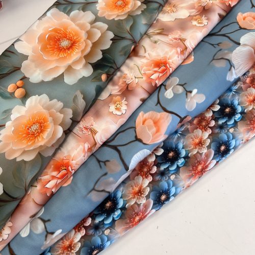 Kék alapon cseresznyevirágos digitálisan nyomott viszkóz voile