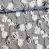 Szürkés alapon szürke-fehér tulipános dekortextil
