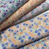 Kedves virágos: Fehér a. NARANCS-KÉK dekortextil (digitálisan nyomott)