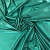 1 m EGYBEN KÉRHETŐ Benetton zöld elasztikus fényes lamé (single foil jersey) (szélén picikét gyűrött)
