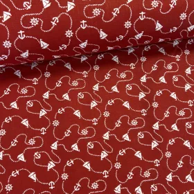 Piros alapon kishajós-kormánykerekes pamutvászon