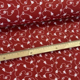 Piros alapon kishajós-kormánykerekes pamutvászon