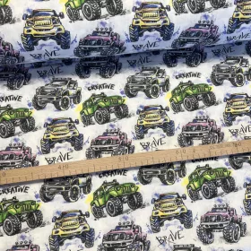 Fehér alapon színes monster truckos pamutvászon