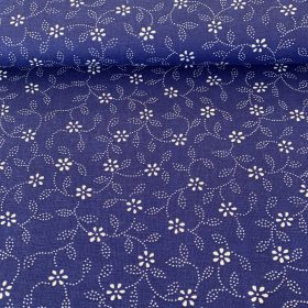   Indigókék alapon pöttyökből álló leveles, virágos kékfestő jellegű pamutvászon