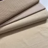0,2 m Szál hibás EGYBEN KÉRHETŐ Világos bézs alapon 2 mm-es kispöttyös pamutvászon (7676 LT Beige)