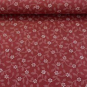   Bordó alapon fehér virágos-pöttyökből álló leveles pamutvászon