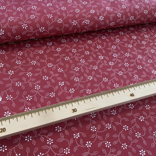 0,95 m EGYBEN KÉRHETŐ Bordó alapon fehér virágos-pöttyökből álló leveles pamutvászon