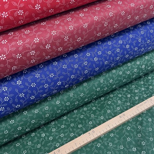 0,95 m EGYBEN KÉRHETŐ Bordó alapon fehér virágos-pöttyökből álló leveles pamutvászon