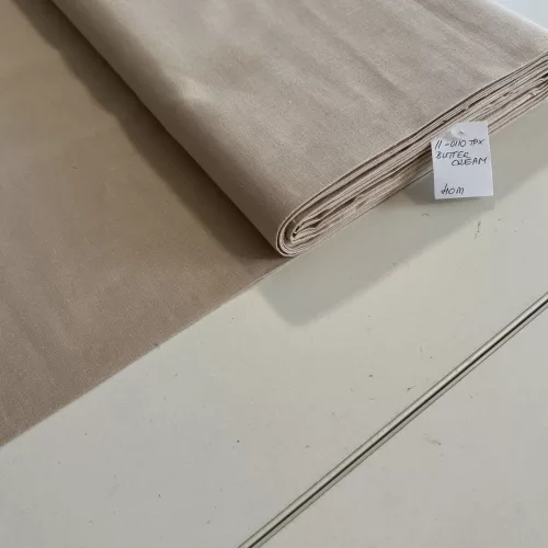 0,27 m EGYBEN KÉRHETŐ Halvány homokos part egyszínű pamutvászon (Butter Cream No.2 11-0110 TPX)