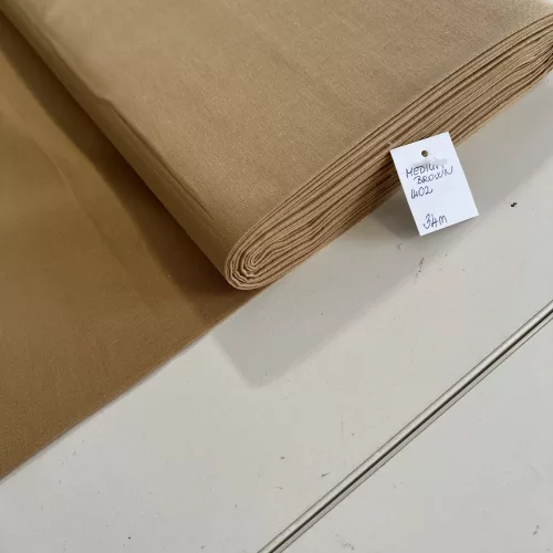 0,53 m EGYBEN KÉRHETŐ Sötét homokos part egyszínű pamutvászon (Medium Brown 1402)