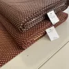 Toffifee barna alapon 2 mm-es kispöttyös pamutvászon (Toffee/Coffee)